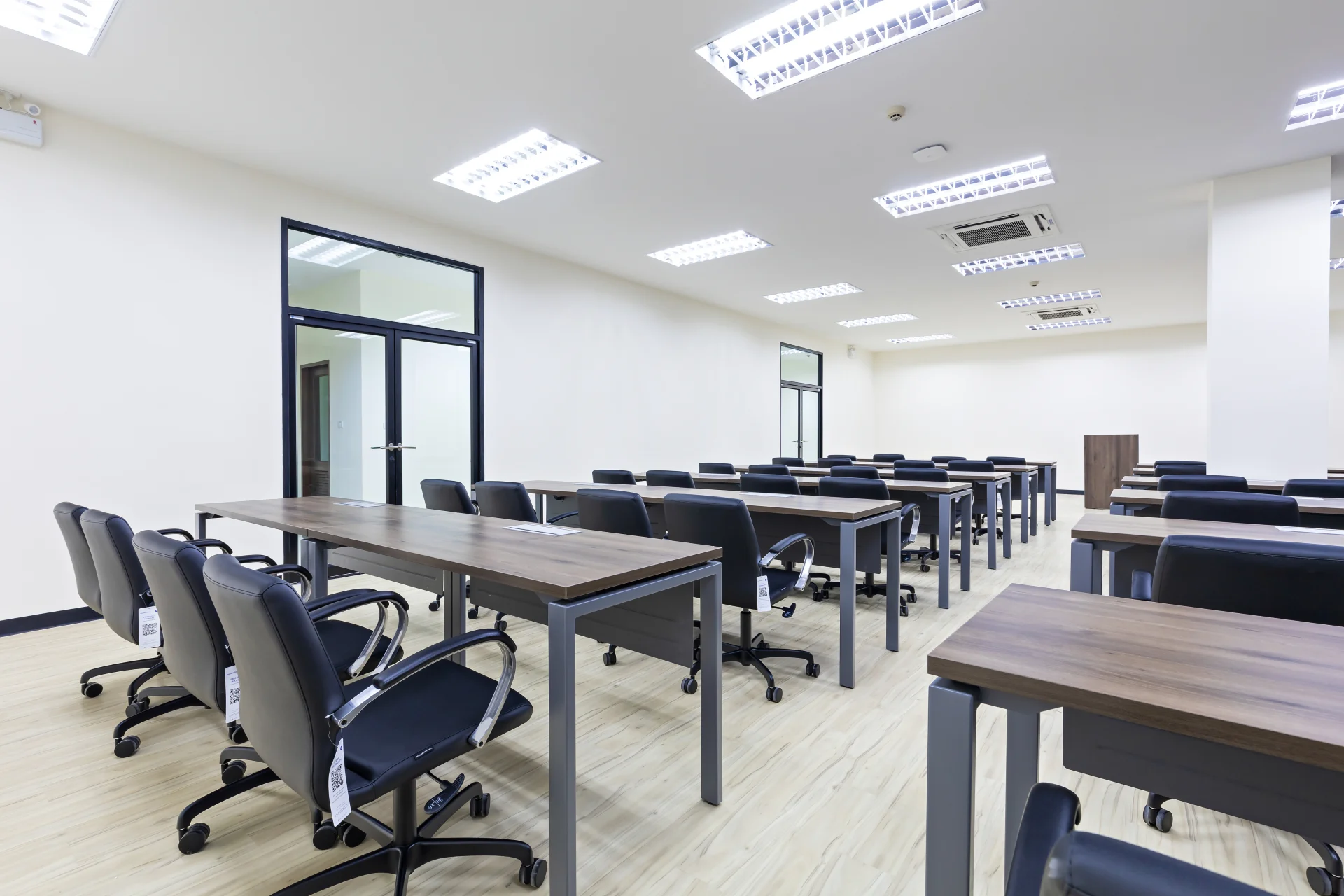 Modern classroom with desks and chairs for marine navigation training